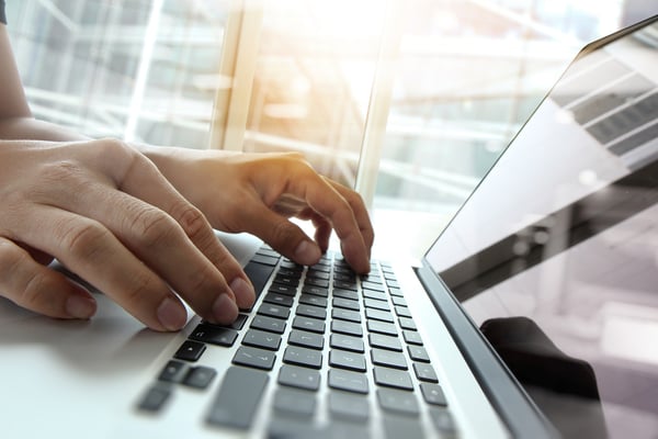 Person using technology to do more with less